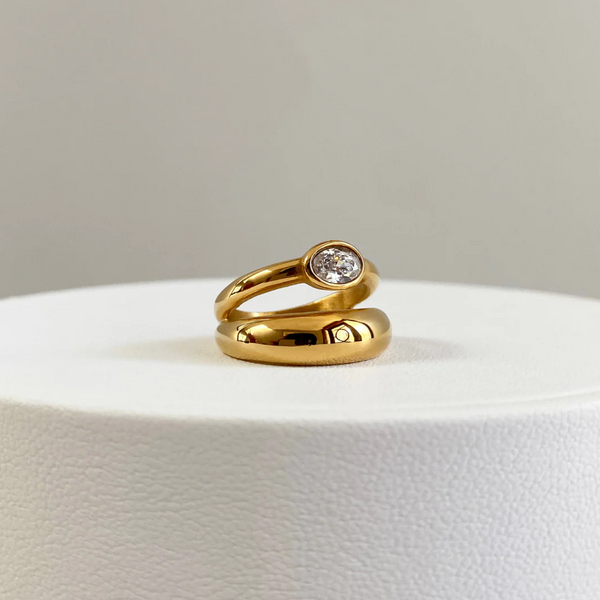 Gold plated double ring with stone